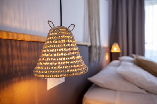 a lamp on a bed