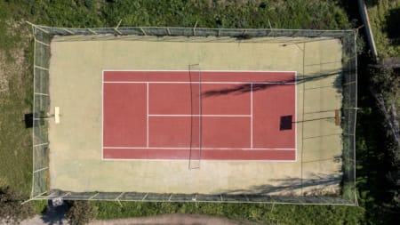 a square object with a red and white design on it