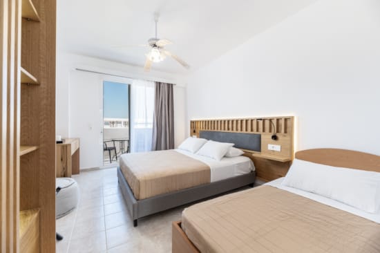 a bedroom with two beds