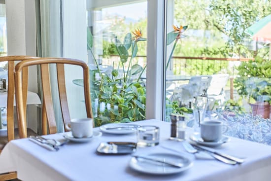 a table with plates and cups on it