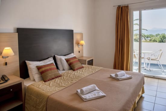 a bed with a large window