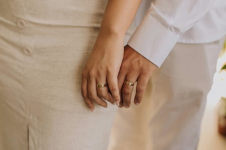a person holding the hands together