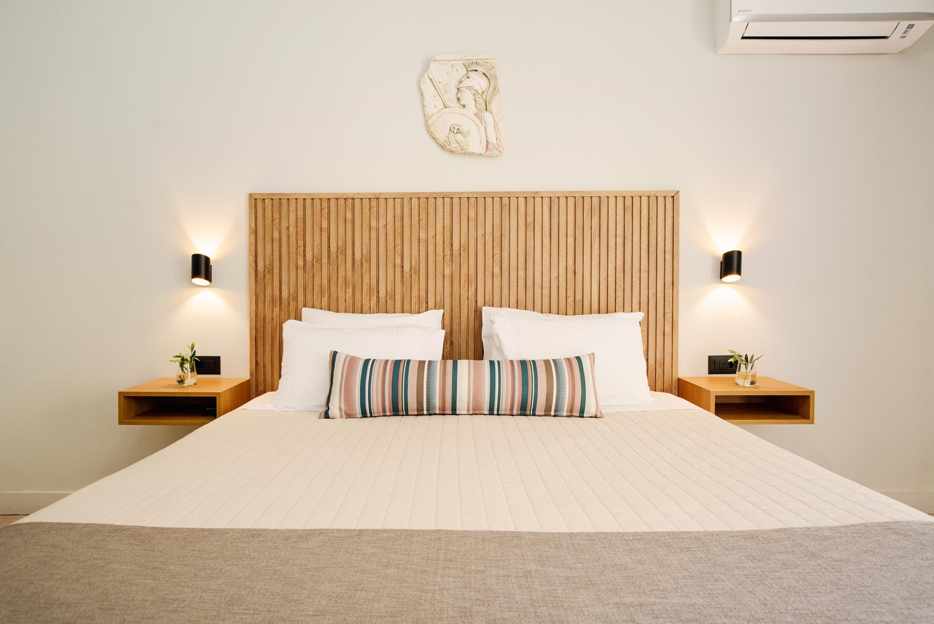 a bed with a wooden headboard