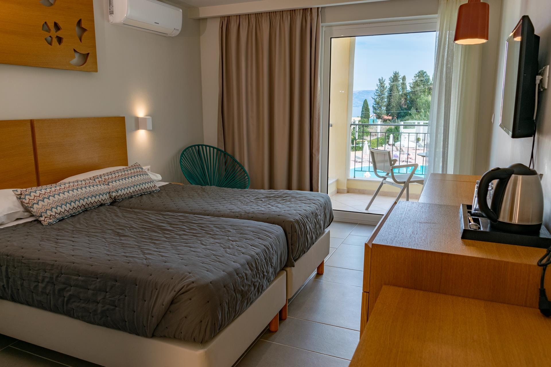 a room with two beds and a table