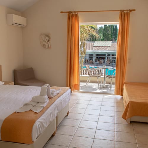 a bedroom with a large window