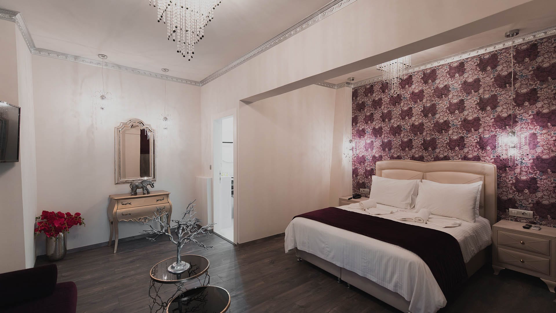 a bedroom with a bed and a table