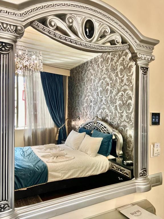 a bed with a decorative frame