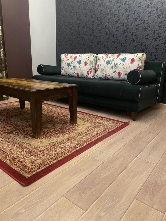 a living room with a couch and a coffee table