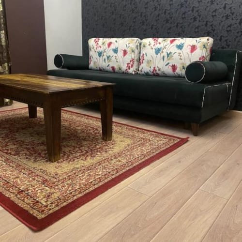 a living room with a couch and a coffee table