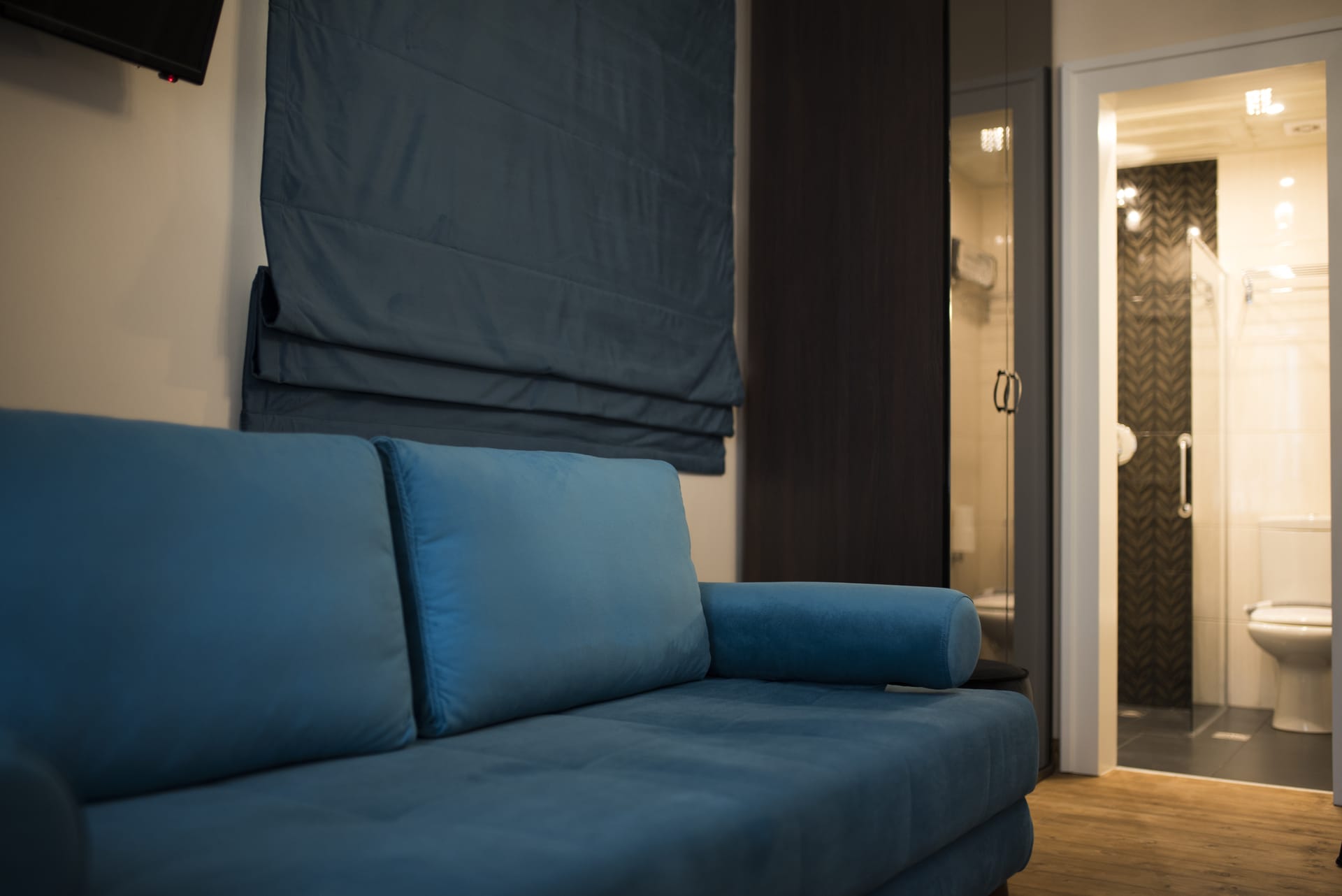 a blue couch in a room