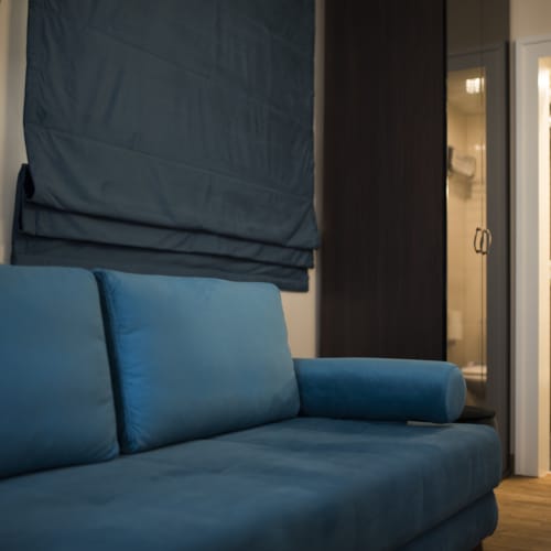 a blue couch in a room