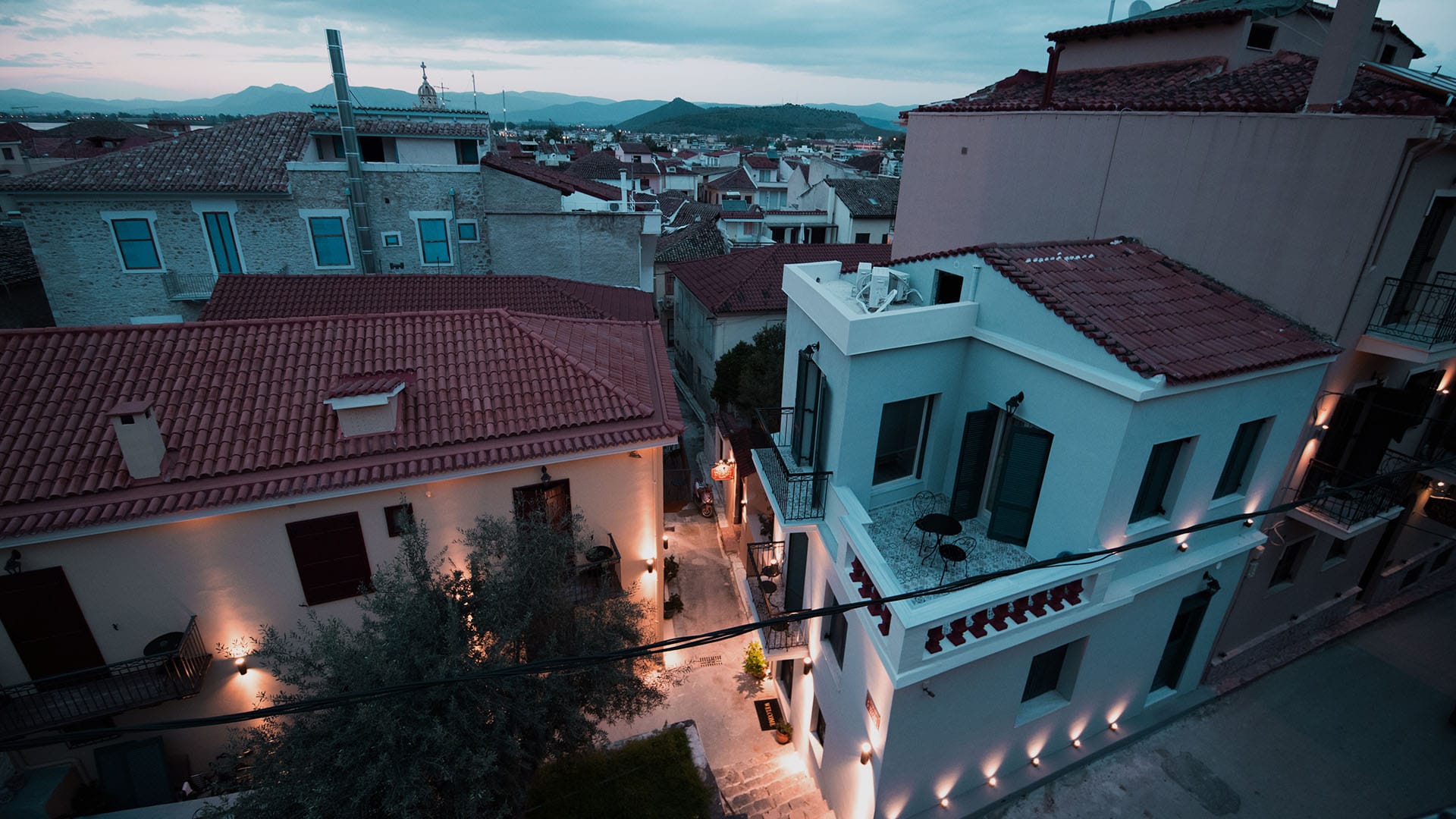 a group of buildings with lights on