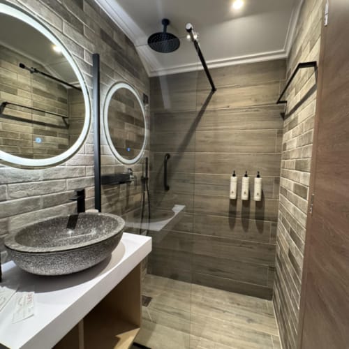 a bathroom with a large mirror