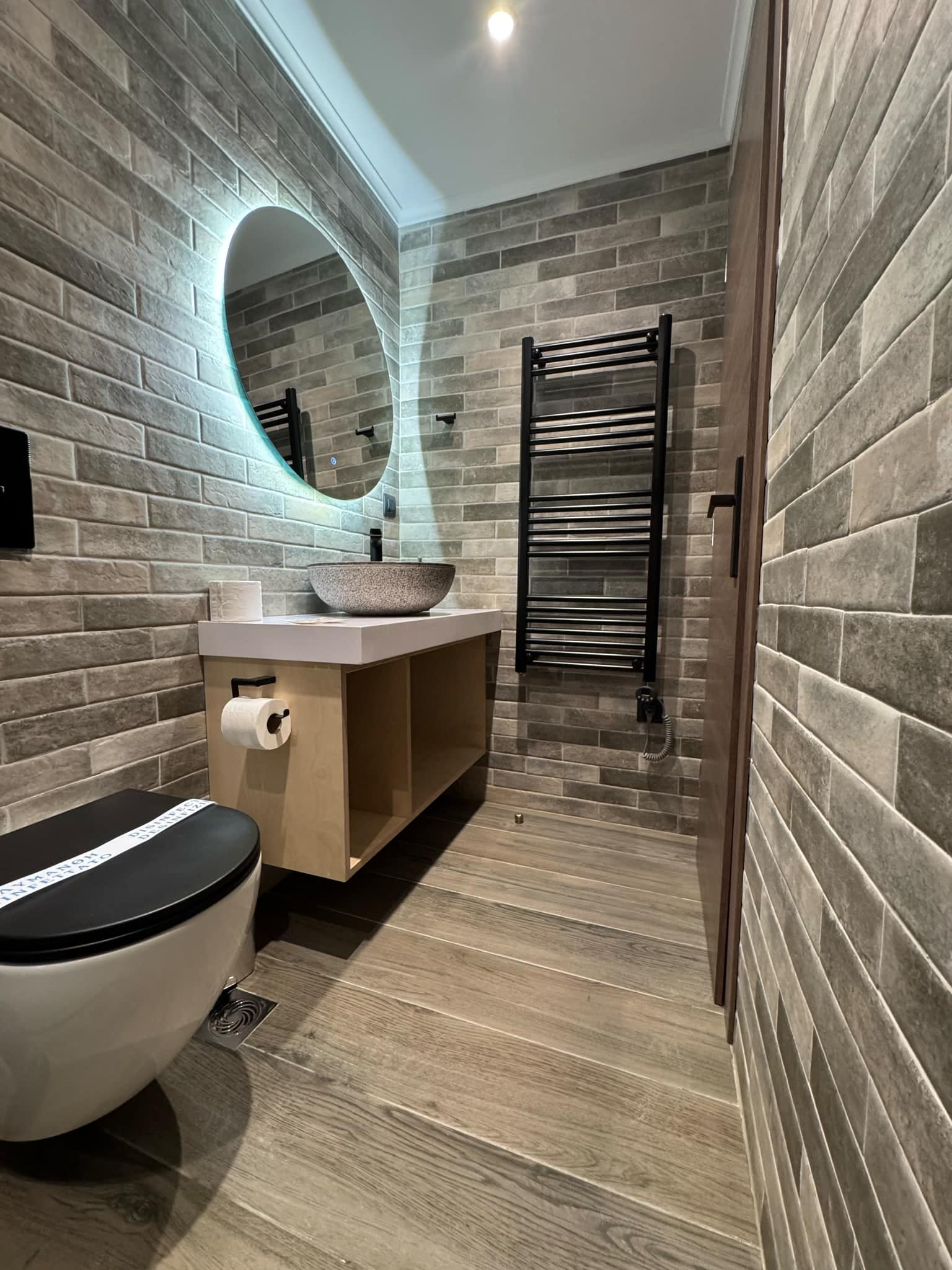 a bathroom with a sink and a toilet