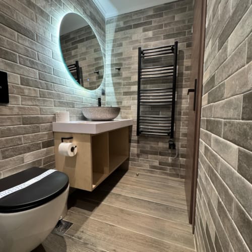 a bathroom with a sink and a toilet