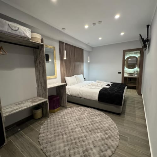 a bedroom with two beds