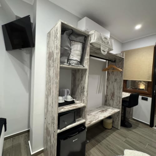 a kitchen with a large mirror