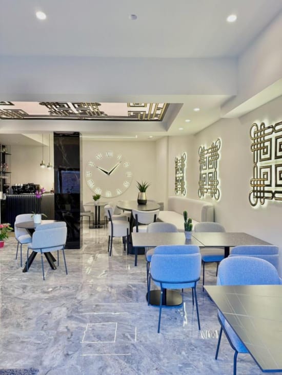 a room with tables and chairs