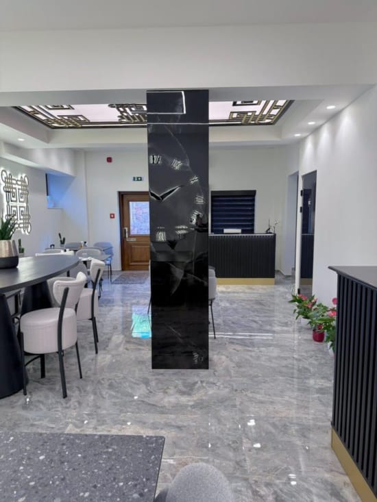 a room with a table and chairs