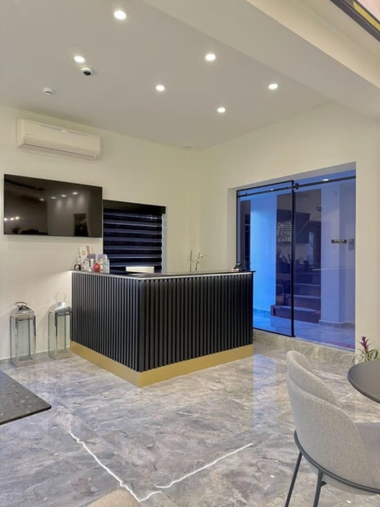 a room with a bar and a grill