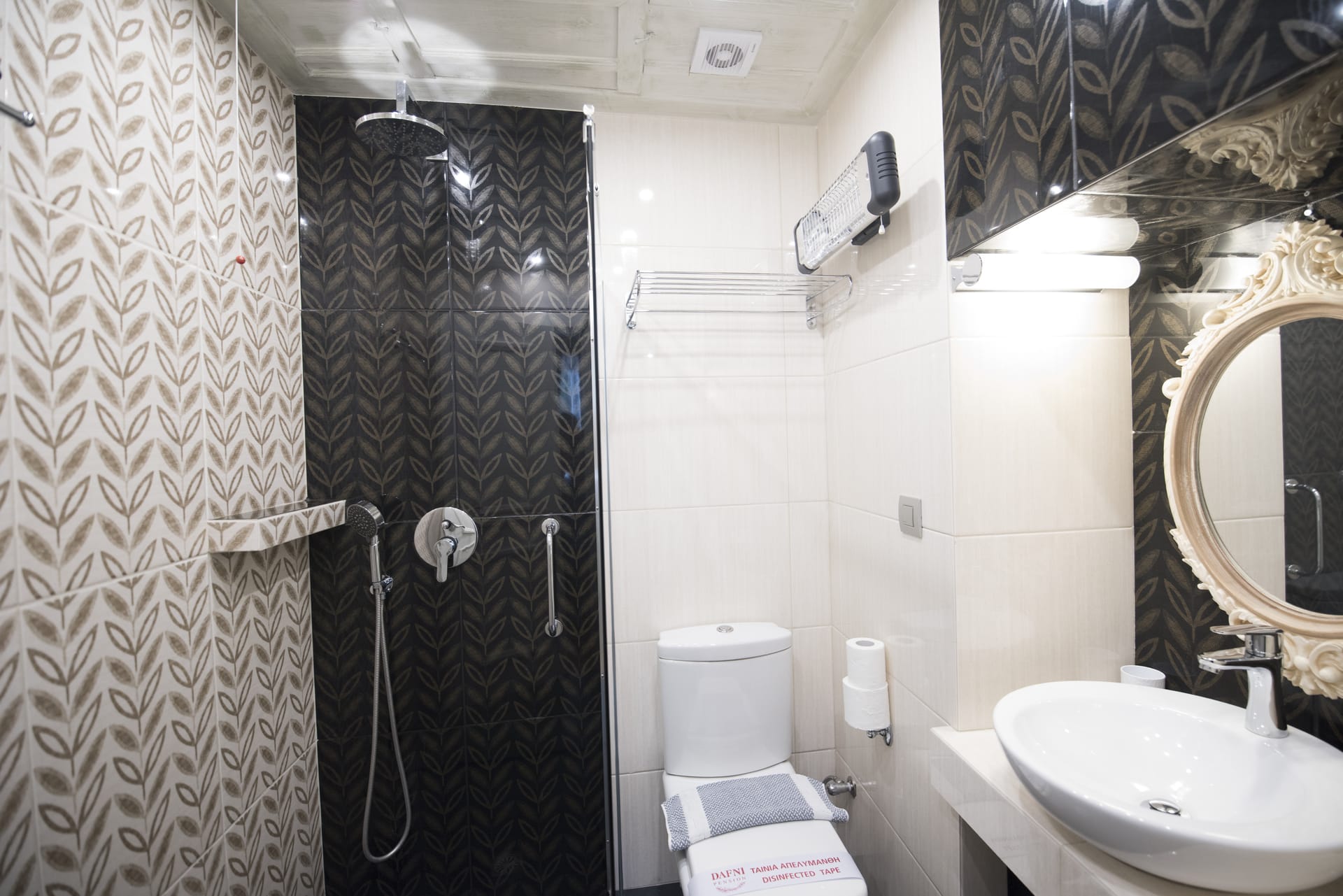 a bathroom with a shower and sink