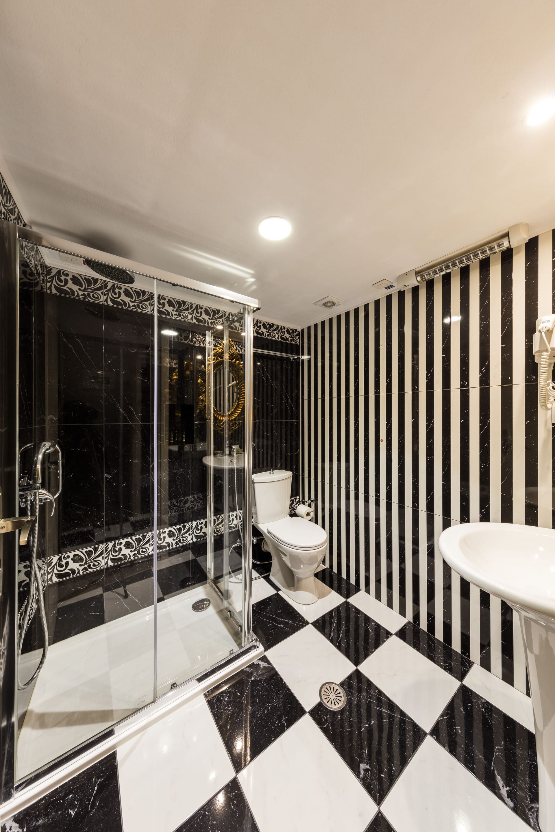 a bathroom with a glass shower