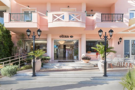 a building with a patio and a fence