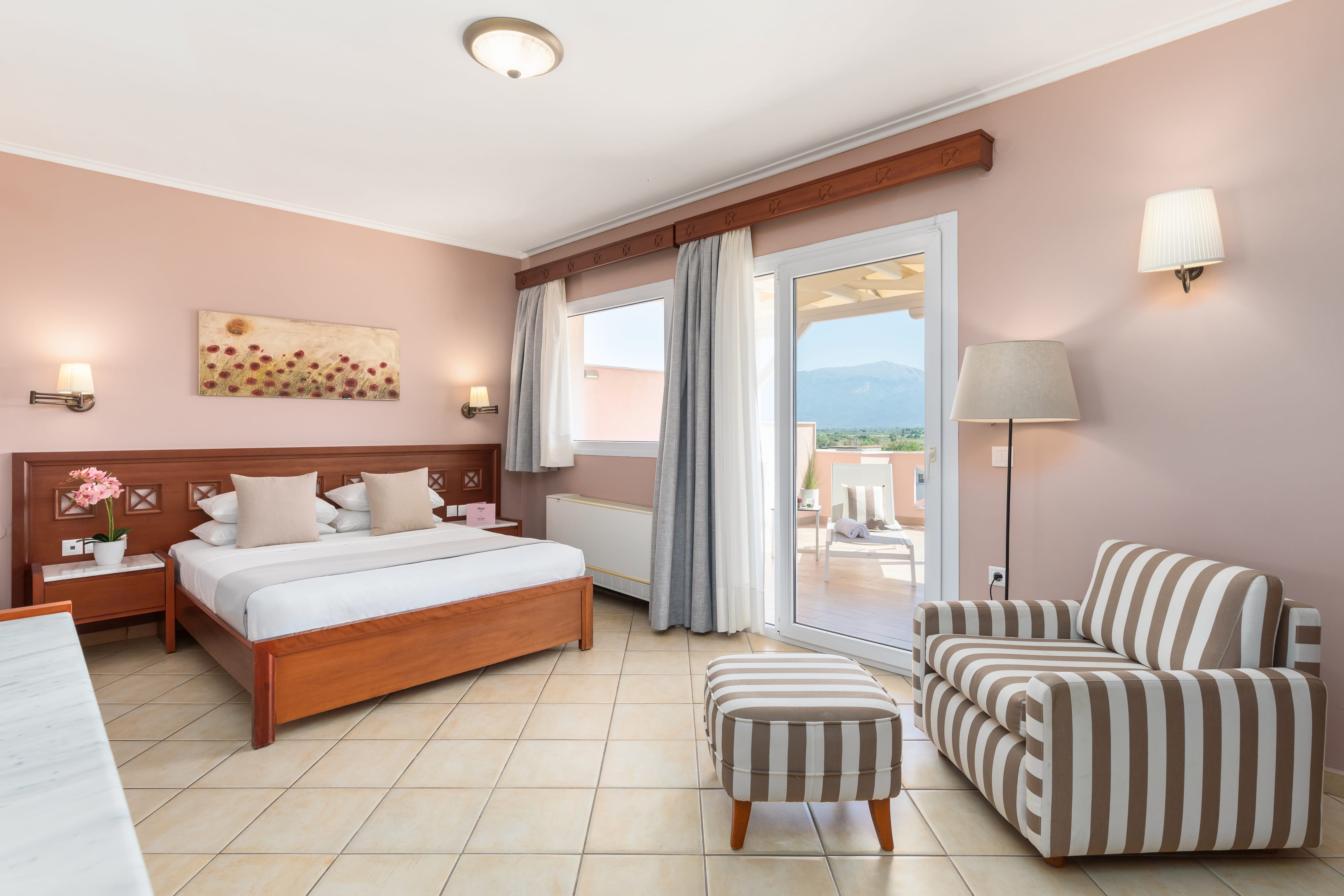 a bedroom with a bed and a chair