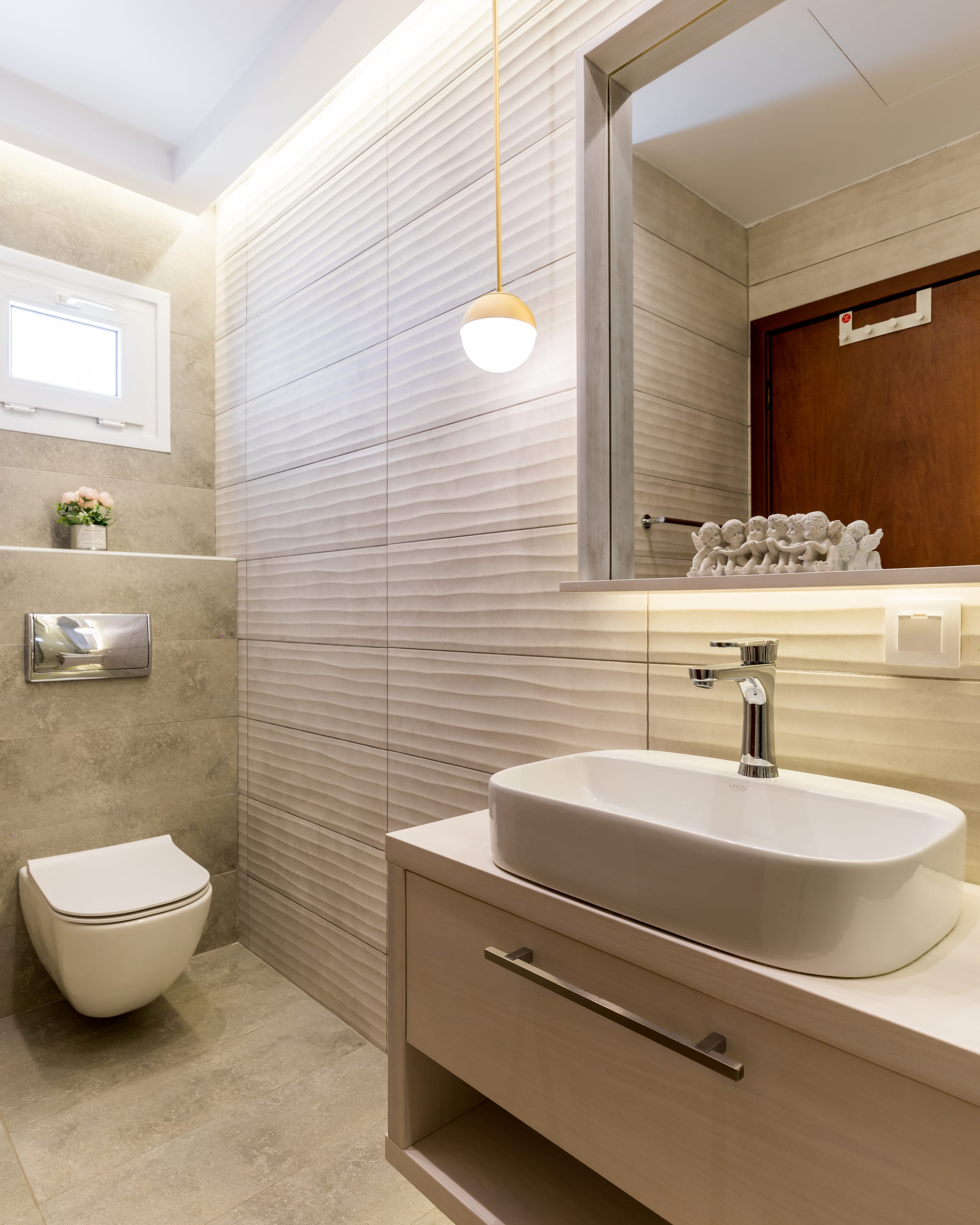 a bathroom with a shower and sink