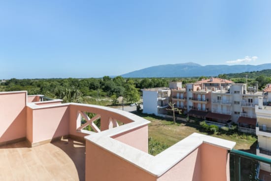 a rooftop view of a town