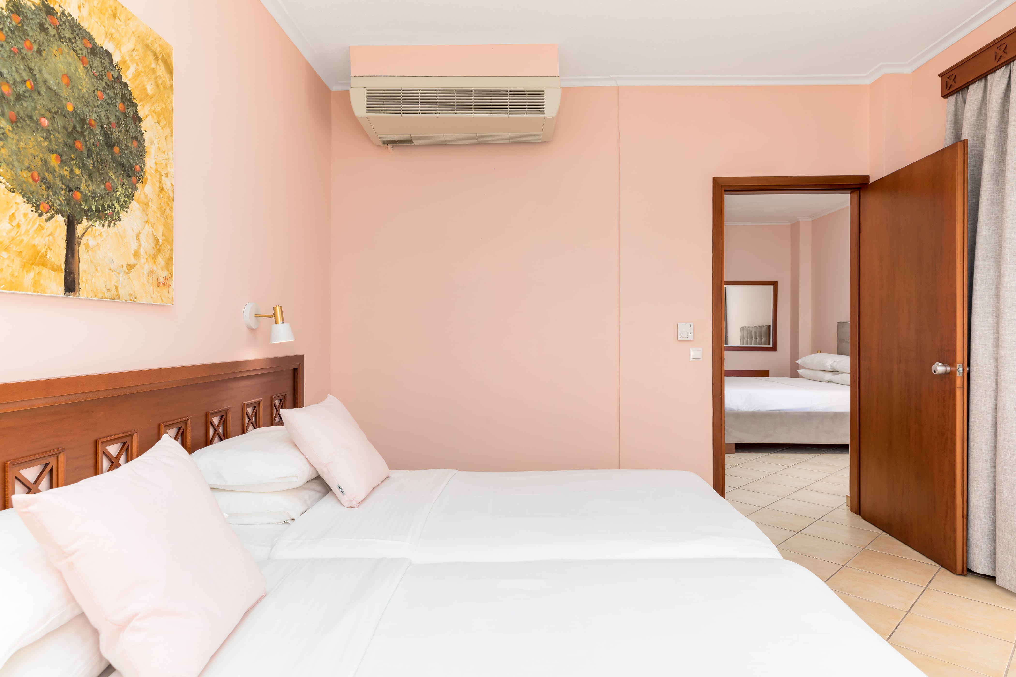 a bedroom with a large mirror