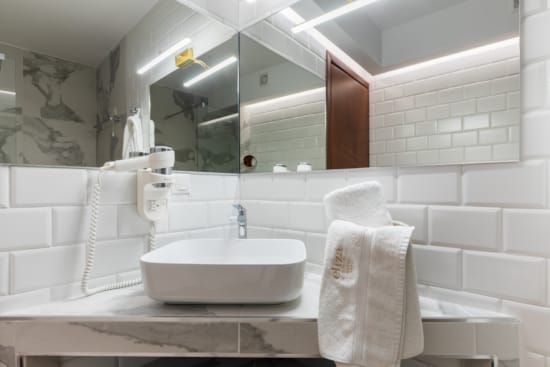 a bathroom with a large mirror