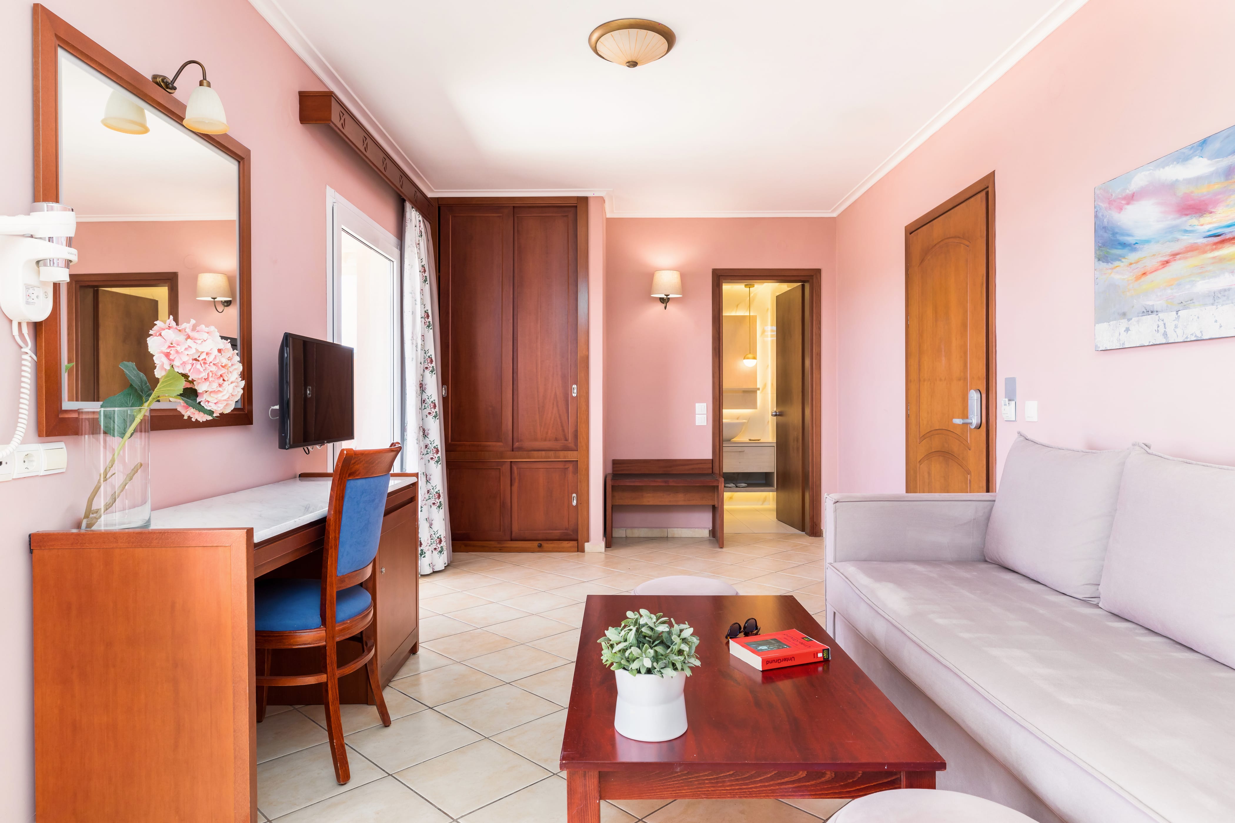 a living room with a couch and a table