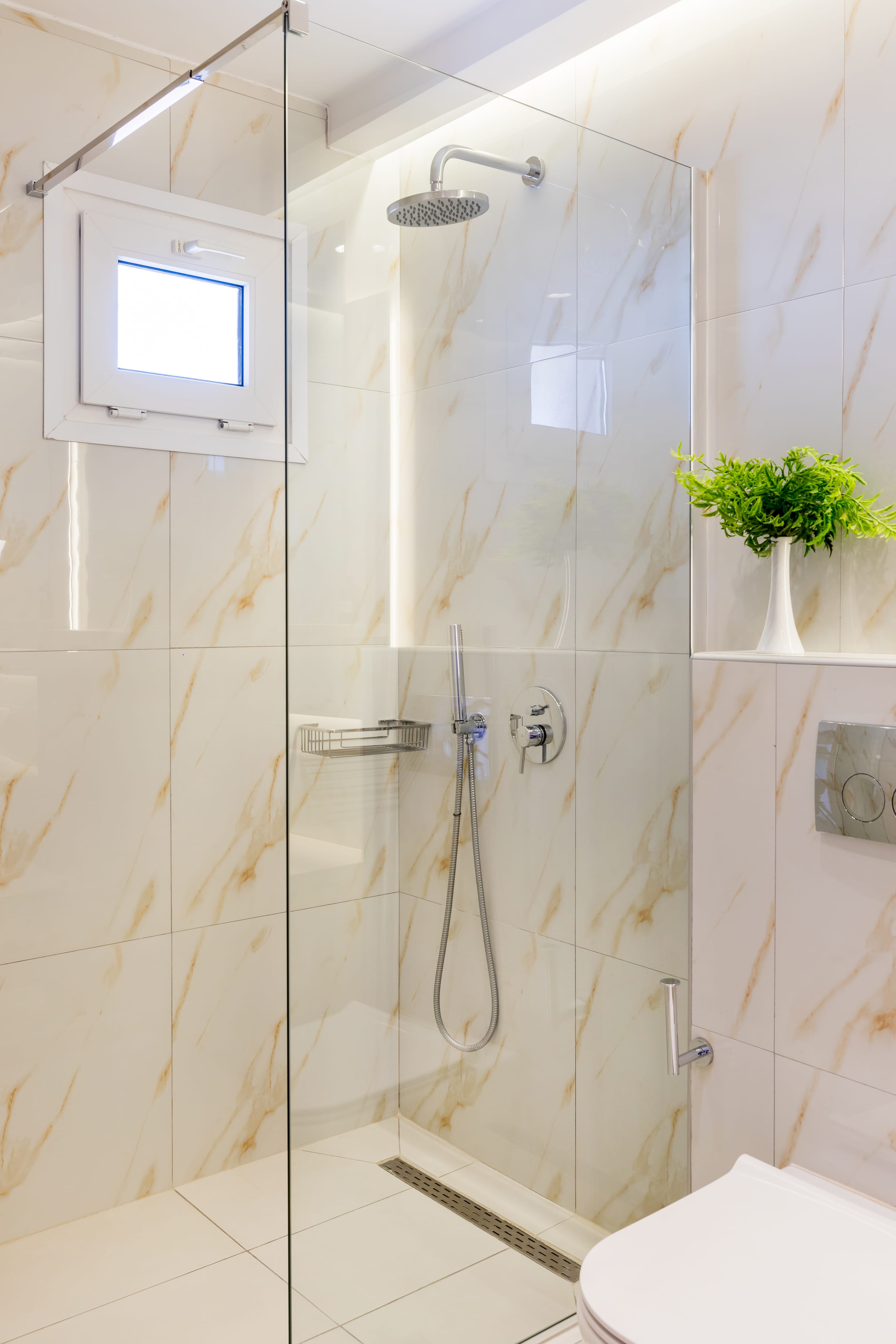 a shower with a glass door