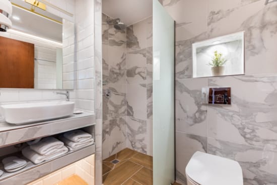 a bathroom with a shower curtain