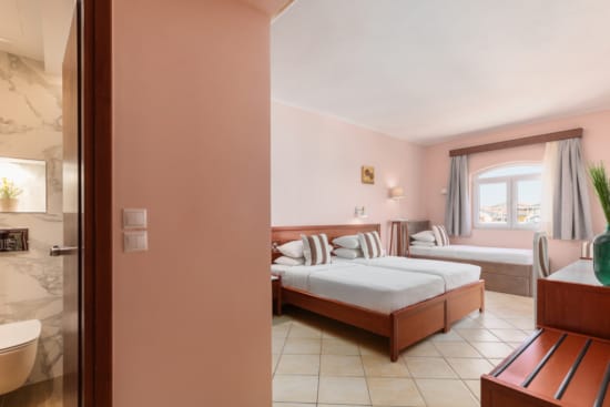 a bedroom with two beds