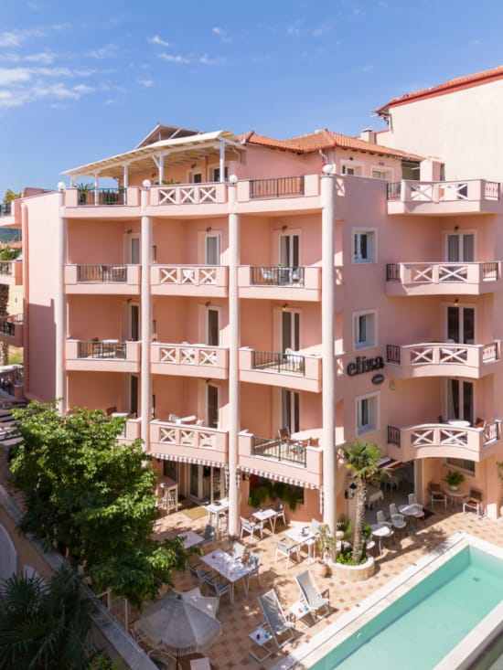 a building with chairs and tables outside