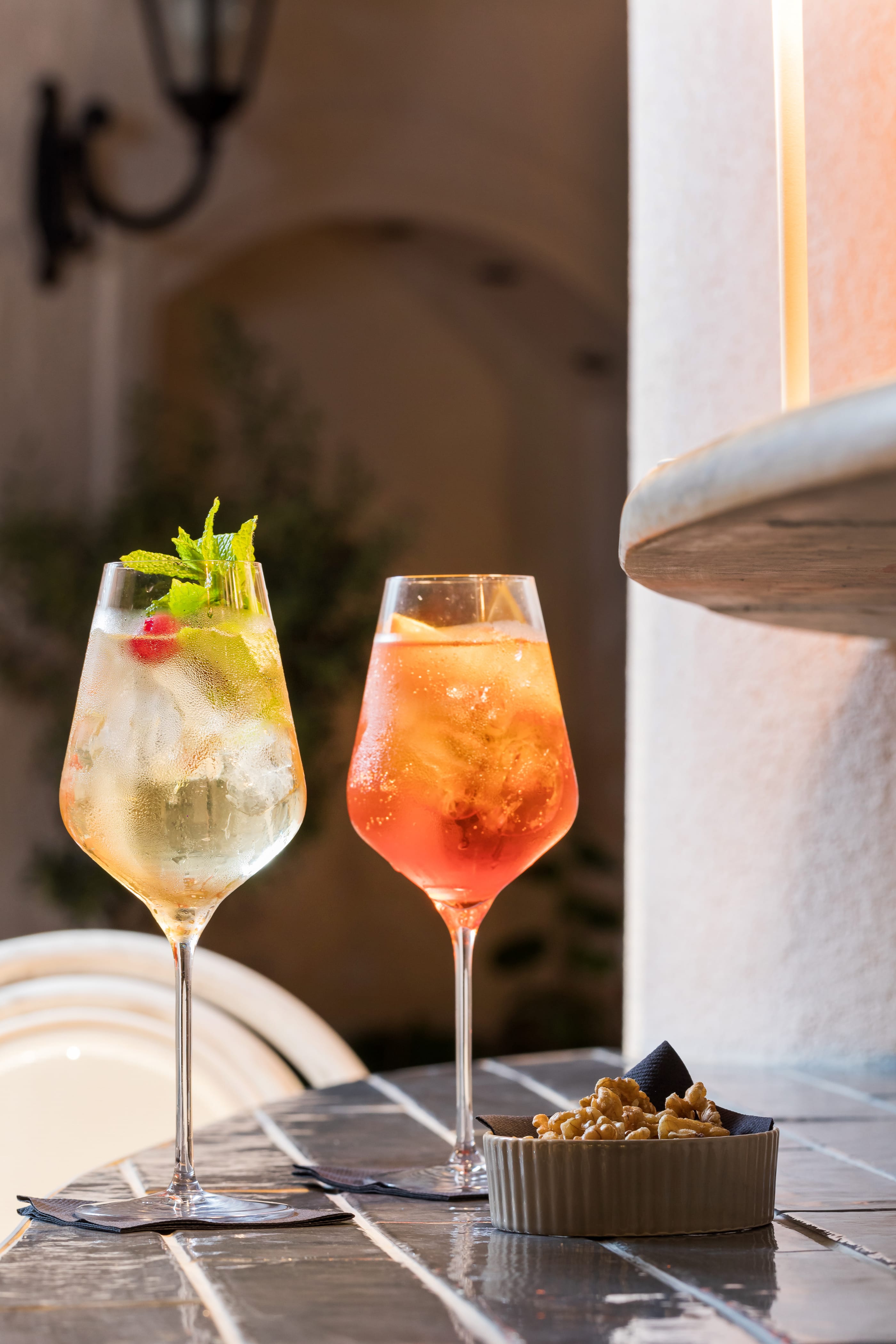 two glasses of wine on a table