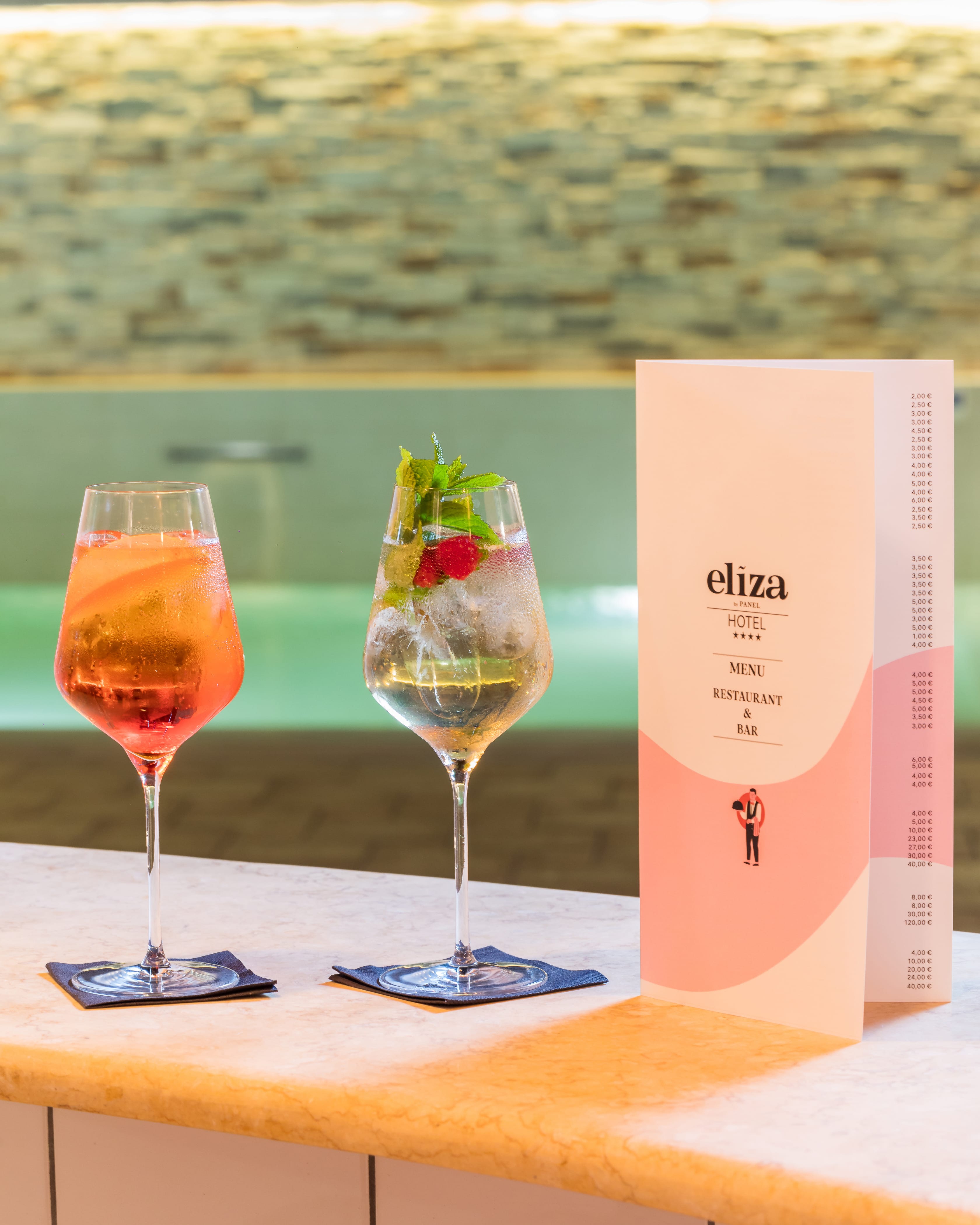 two glasses of wine on a table