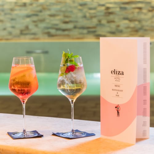 two glasses of wine on a table