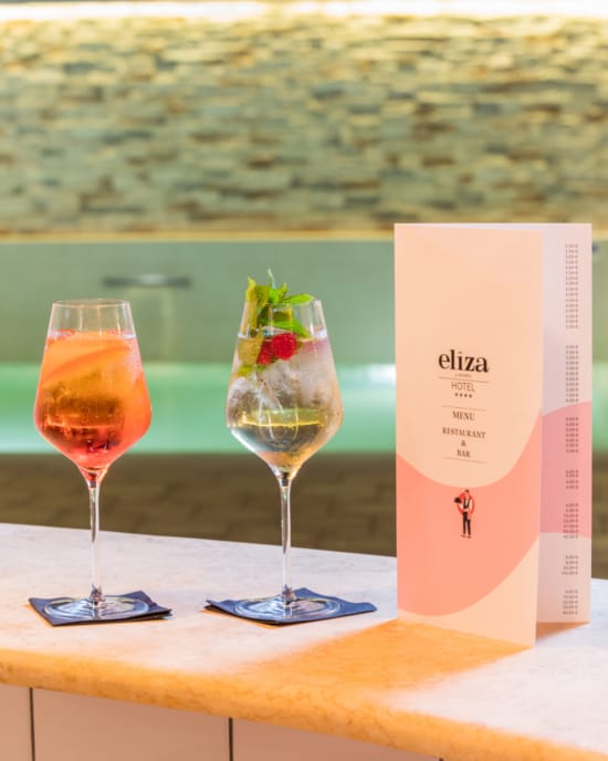 two glasses of wine on a table