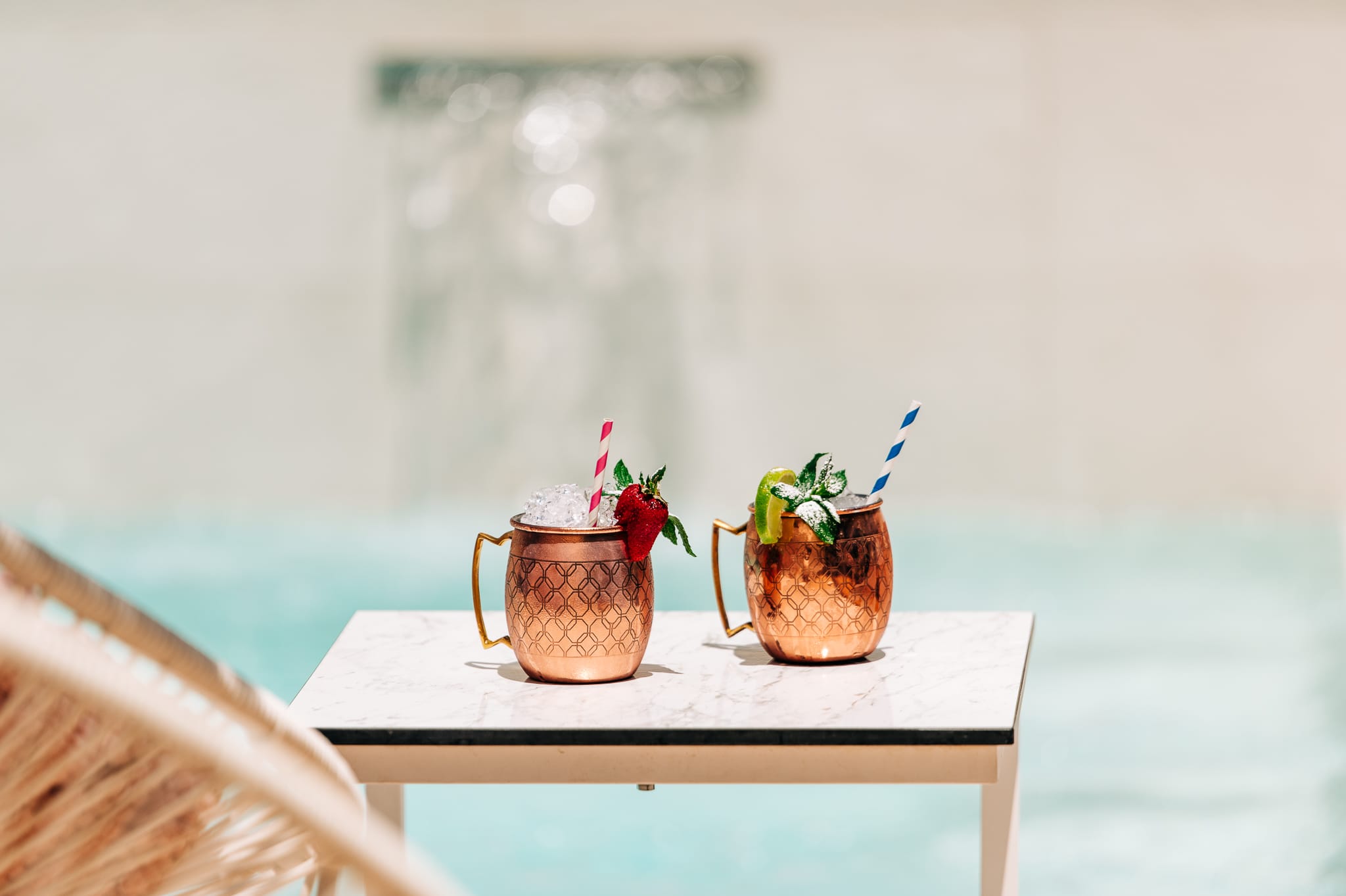 two brown pots with plants in them