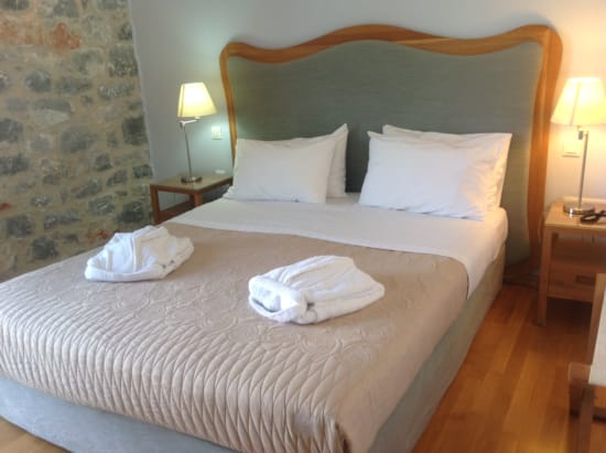 a hotel room with two beds