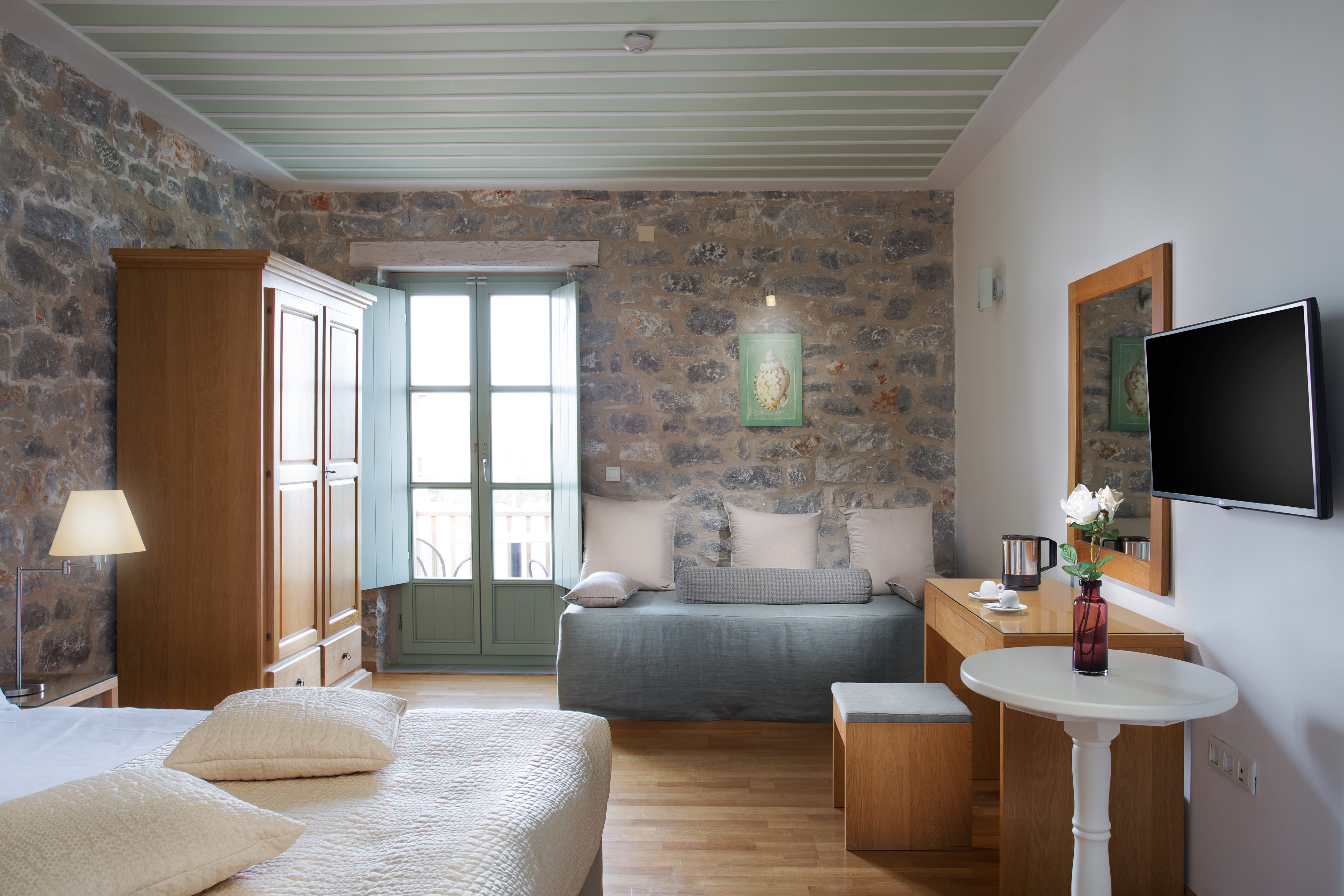 a living room with a couch and a tv