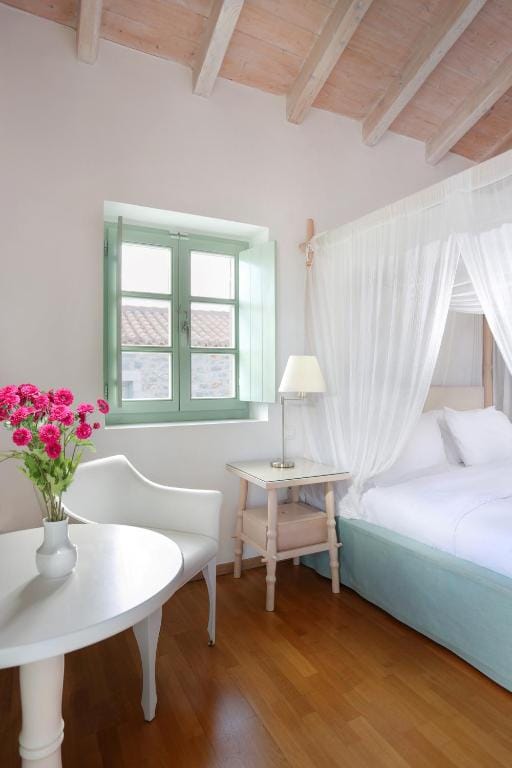 a room with a bed and a table