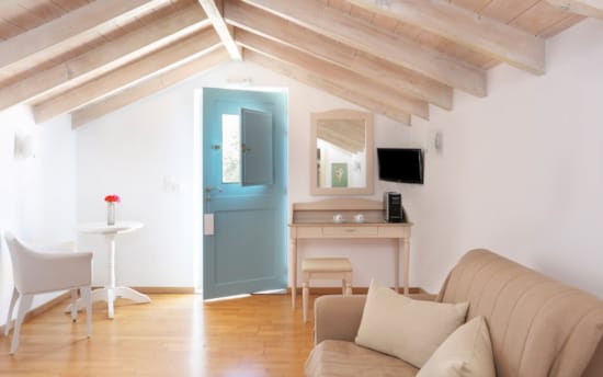 a living room with a blue door
