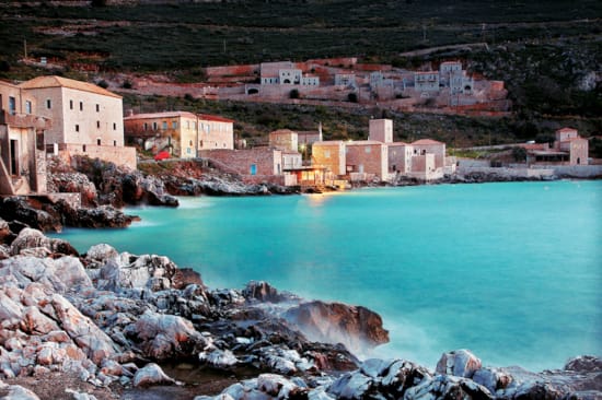 a city on the edge of a cliff