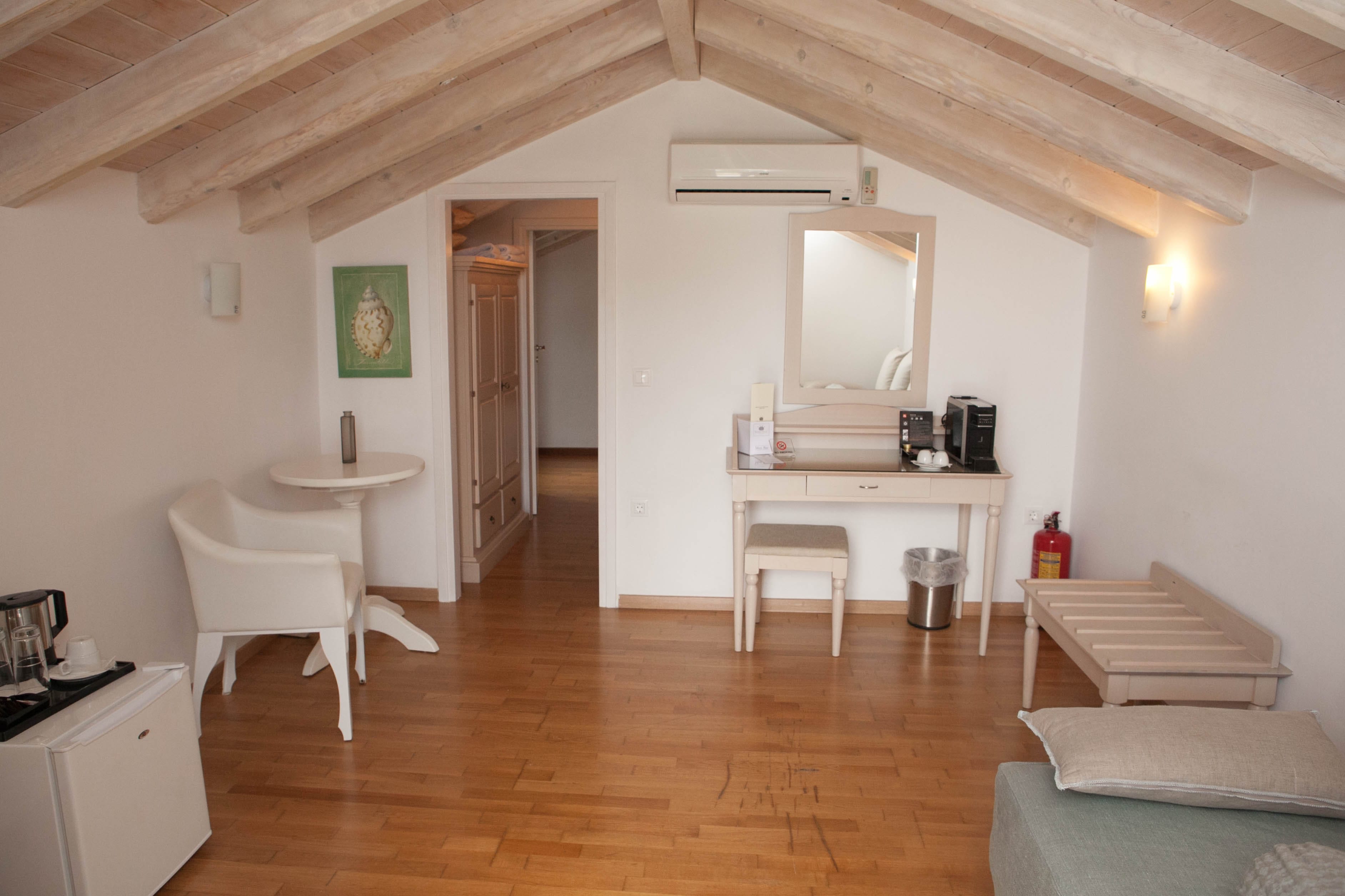 a room with a table and chairs