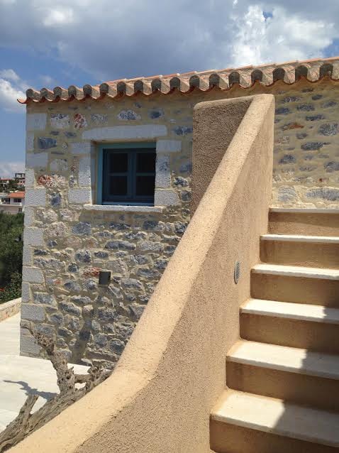 a stone building with a stone staircase