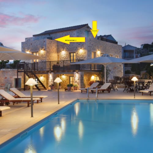 a pool with a building in the background